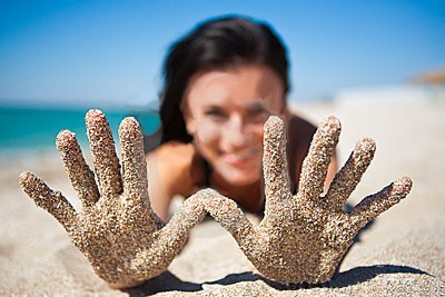 handen op het strand